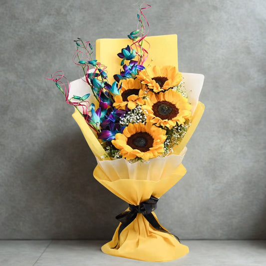 A vibrant celebration of nature's finest — sun-kissed sunflowers paired with elegant orchids in full bloom. This bouquet balances warmth and refinement, making it the perfect gift to uplift, impress, and inspire.

