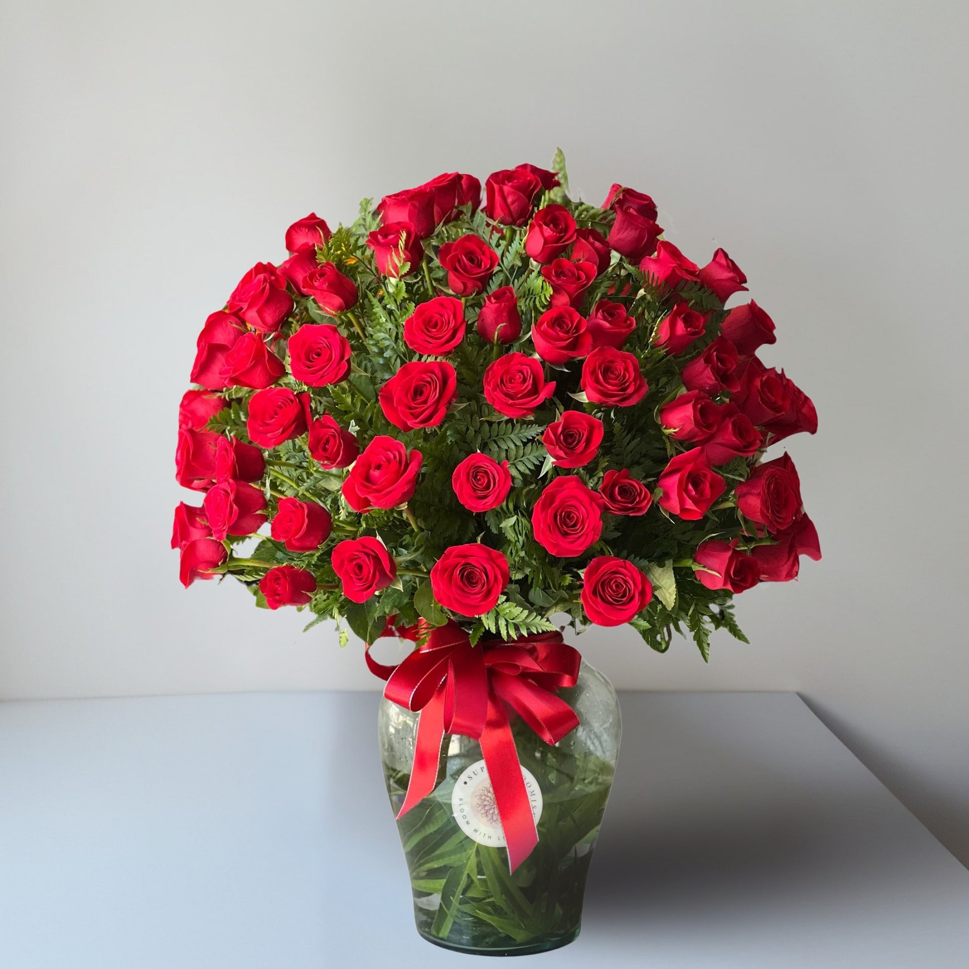 A breathtaking display of love and devotion, this luxurious bouquet features 100 hand-selected roses, symbolizing passion, admiration, and eternal romance. The lush arrangement of velvety petals creates a stunning visual masterpiece, making it the ultimate grand gesture for someone truly special.